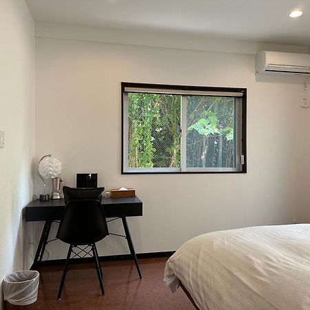 Ferienwohnung White Reef Uruma Exterior foto