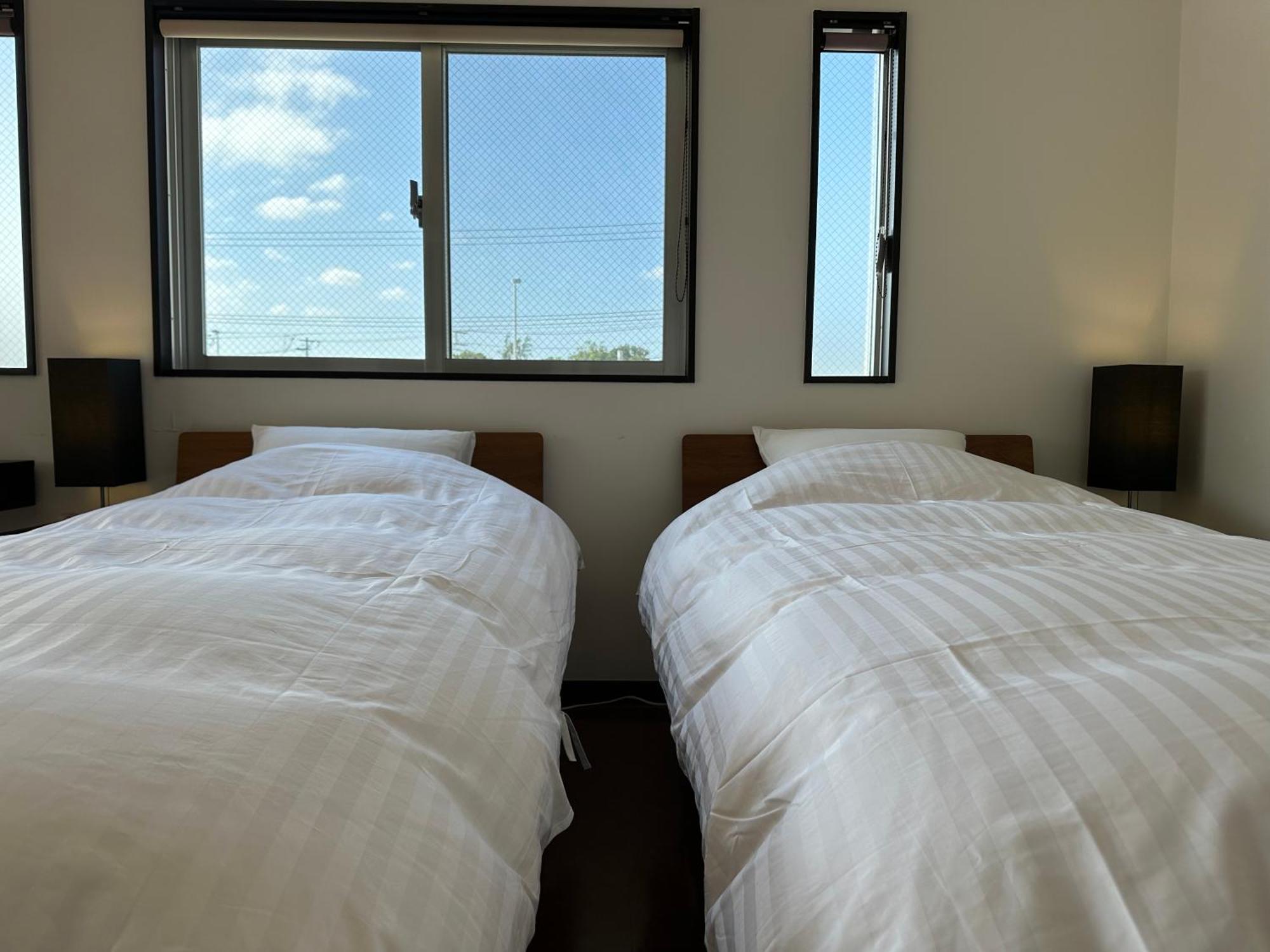 Ferienwohnung White Reef Uruma Exterior foto
