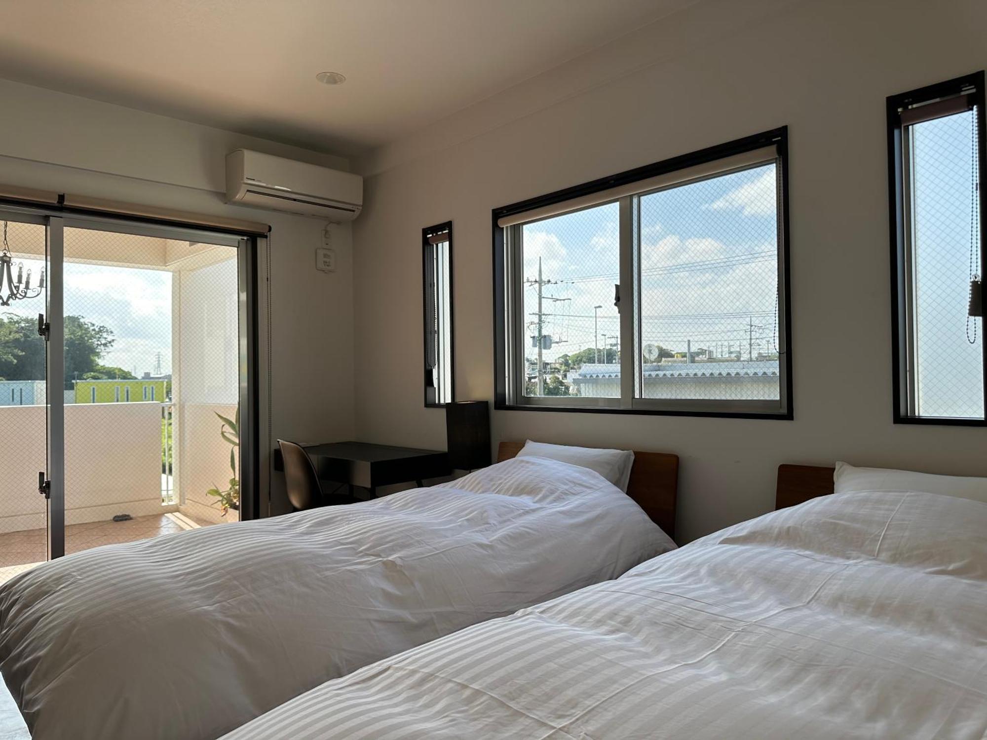Ferienwohnung White Reef Uruma Exterior foto