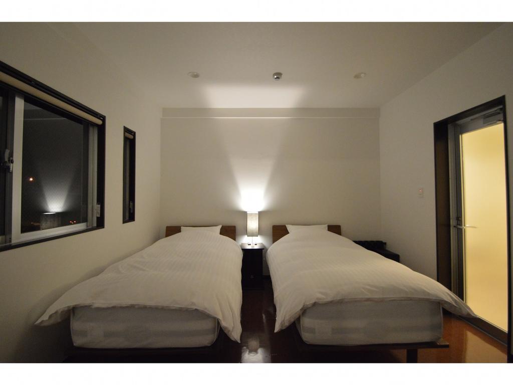 Ferienwohnung White Reef Uruma Exterior foto